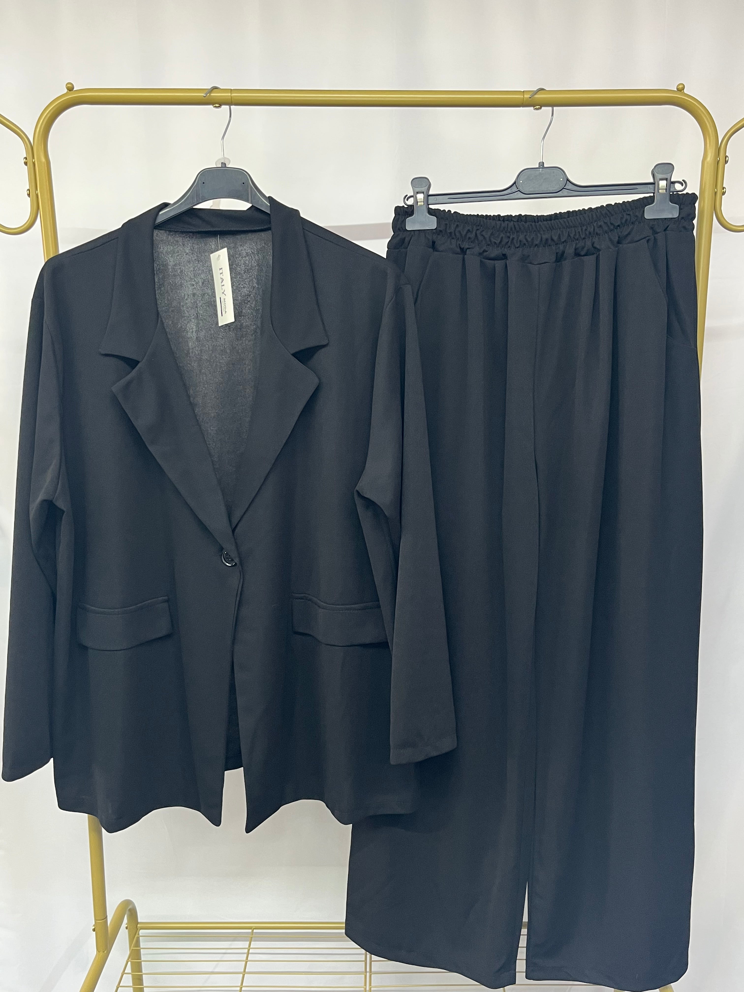 Completo con giacca sfoderata e pantalone a palazzo