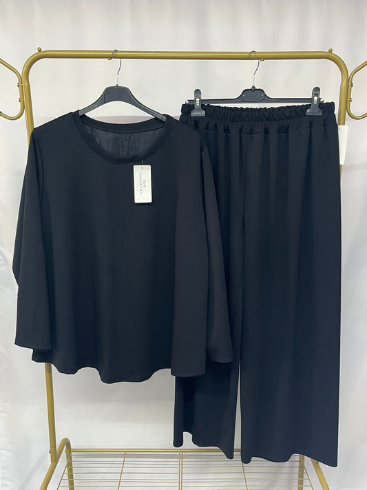 Tuta semplice con pantalone a palazzo