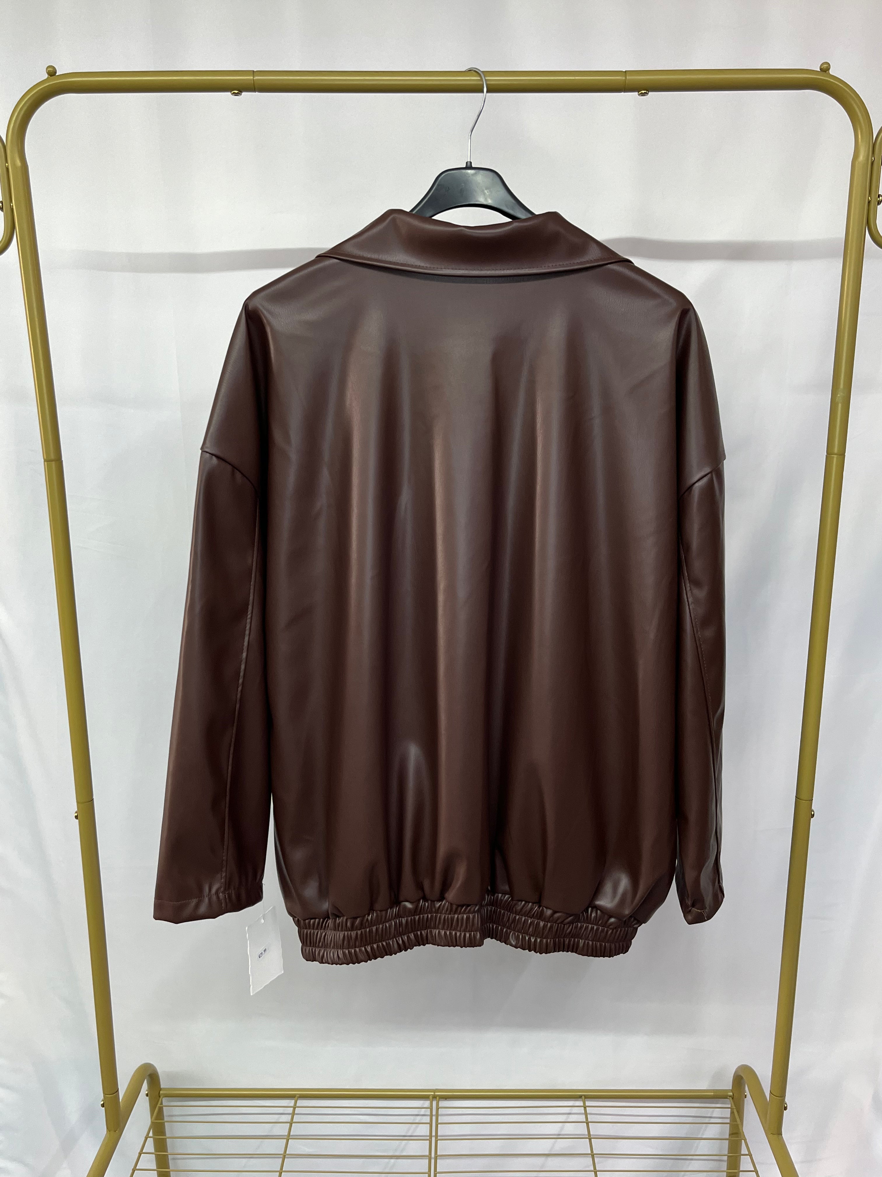 Giubbetto semplice eco pelle con colletto e tasche